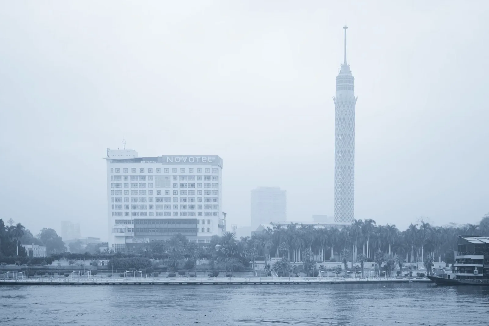 A broad Cairo cityscape in warm morning light